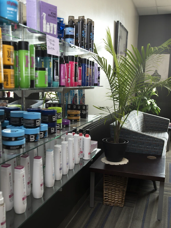 hair-care-products-available-the-look-salon Shelf displaying hair care products